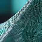 Capacitive Touch-Sensing Fabric Grids being woven.